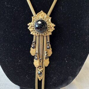 Vintage Jack Smile Egyptian Revival Art Deco Style Brass Bolo Necklace